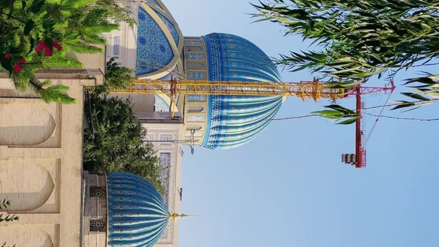 Khast Imam Square with an architectural complex combining ancient religious buildings with modern ones. Lawns, flower beds, shrubs. Cathedral Mosque in Tashkent. 4K