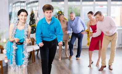 Young couple dancing and practicing in dance class