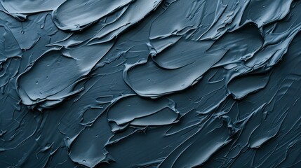 textured blue acrylic background The dark blue acrylic texture is rich with intense brushstrokes, evoking the depth of the midnight sea..