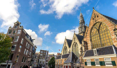 Street view of Amsterdam and Oude Kerk (Old Church)