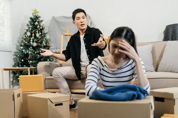 Unhappy young couple, having problems in relationship, thinking of breaking up or divorce, upset.