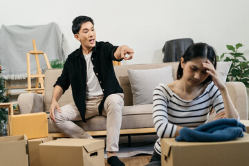 Unhappy young couple, having problems in relationship, thinking of breaking up or divorce, upset.