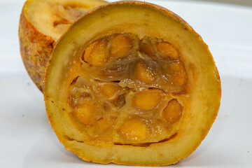 Jenipapo fruit (Genipa americana) in selective focus in details that define the characteristics of the species