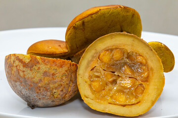 Jenipapo fruit (Genipa americana) in selective focus in details that define the characteristics of the species