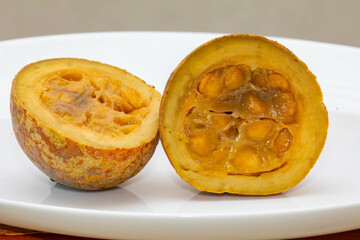 Jenipapo fruit (Genipa americana) in selective focus in details that define the characteristics of the species