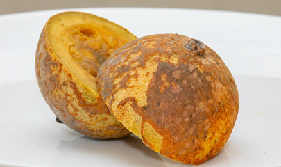 Jenipapo fruit (Genipa americana) in selective focus in details that define the characteristics of the species