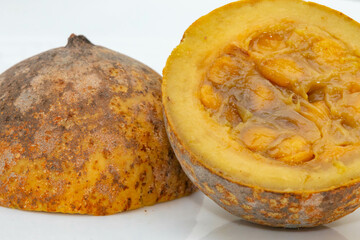 Jenipapo fruit (Genipa americana) in selective focus in details that define the characteristics of the species