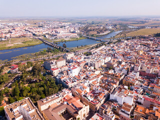 Fototapeta na wymiar Aerial panoramic view of modern cityscape of Badajoz with Guadiana river, Spain