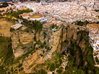 Cercles muraux Ronda Pont Neuf Rocky landscape of Ronda city with Puente Nuevo Bridge and buildings, Andalusia, Spain