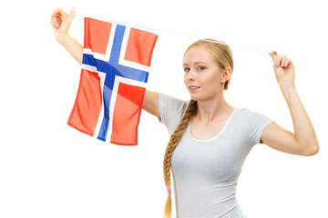 Young woman with norwegian flag