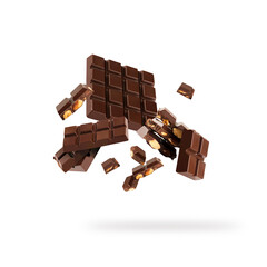 Falling chocolate with nut isolated on white background.