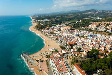 Naklejka na ściany i meble Aerial view of the seaside resort town of San Paul de Mar in Catalonia, Spain