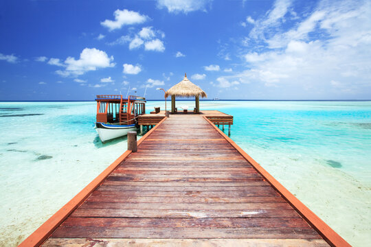 Pier to tropical sea in the Maldives, Indian ocean