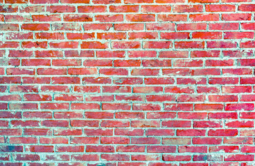 Old vintage retro style rusty red bricks wall for abstract brick background and texture.