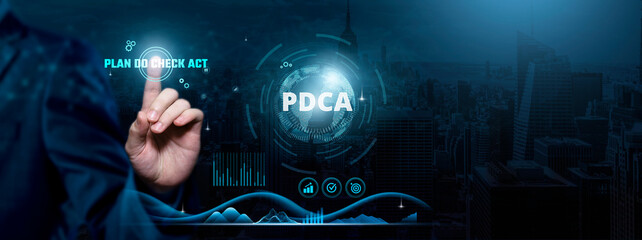 PDCA (Plan-Do-Check-Act), Continuous Improvement, Iterative Processes, Businessman touch PDCA-related text on the global network cyberspace, technology, and innovation concept. - obrazy, fototapety, plakaty
