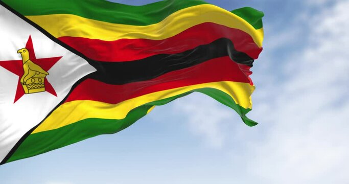 Close-up view of the Zimbabwe national flag waving in the wind