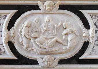  VICENZA, ITALY - NOVEMBER 5, 2023: The the marble baroqe relief of Pieta on the side altar of church Chiesa di Santa Maria dei Servi by Virginio and Flaminio Negri (1609). © Renáta Sedmáková