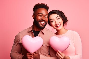 Fototapeta na wymiar Happy couple holding pink heart shaped balloons with pink background, studio photo. Celebrating valentine's day. Generative AI