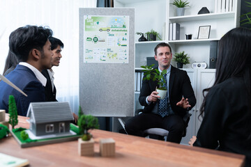 Businessman leader give presentation on corporate social responsibility with reforestation in order...