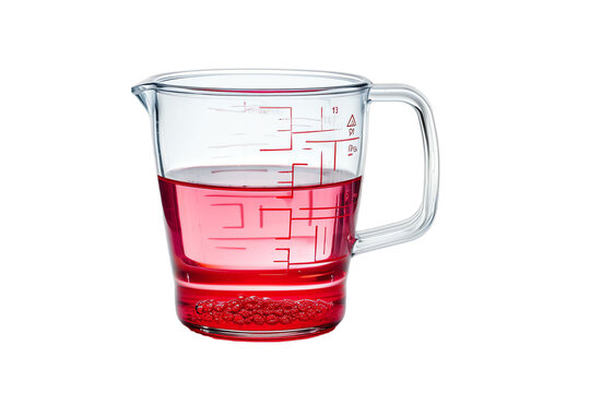 The cup appears to be made of heat-resistant glass. The measuring cup on a transparent background.