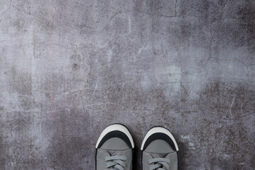 Gray background with pair sneakers on gray background