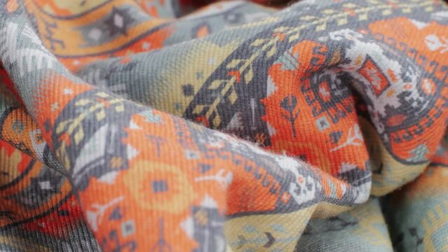 Colorful textile cloth texture close-up macro. Fashion fabric multicolor.