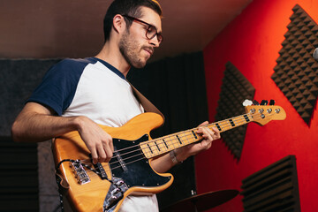 Close-up of a musician playing bass