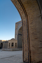 Bukhara, Uzbekistan. View of the entrance of Kalon madrasah during the sunset
