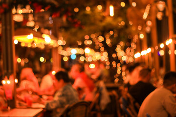 blur image of night festival in a restaurant and The atmosphere is happy and relaxing with bokeh for background