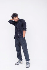 Smiling Young Man in Casual Outfit Leaning Forward