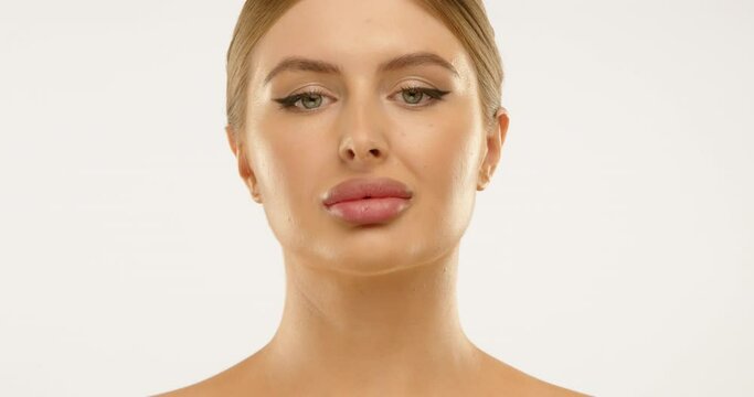 Model with perfectly full and pouty lips, presenting an exquisite example for cosmetic clinics' lip enhancement and filler services advertisements. Camera 8K RAW. 