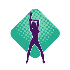 Silhouette of a slim female in dance pose. Silhouette of a woman dancing.