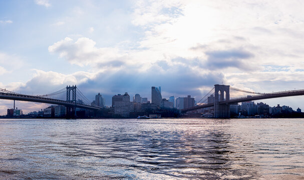 Panoramic view of Brooklyn Bridge and Manhattan Bridge with skyline. © Chansak Joe A.