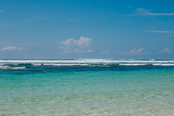 Blue clear ocean water in sunny weather