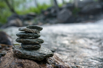 zen stones on the beach ofcreek