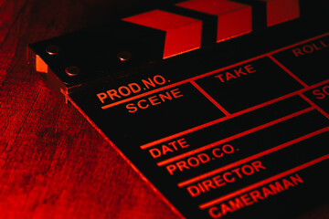 Clapperboard photograph on a table in a local film production. Concept of film and video industry.