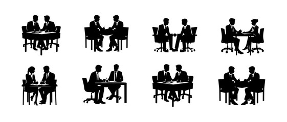 Silhouettes of Business Professionals Engaging in Discussion and One-on-One Meetings in an Office Environment	
