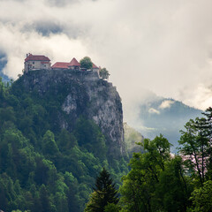 Lake Bled Slovenia with Castle in the background and mountains.
