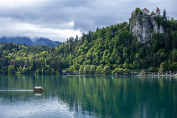 Lake Bled Slovenia with the castle in the background and a small boat