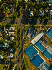 An aerial view of tennis courts and suburban houses in Tamworth, New South Wales, Australia