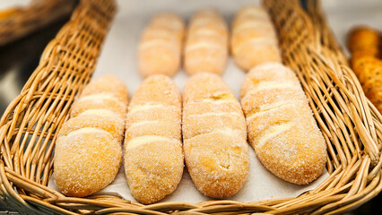 Bread with fresh butter with sugar soft and fluffy, Freshly baked butter buns pastry bread in the basket. Pastry Display Case, Bakery Display Case