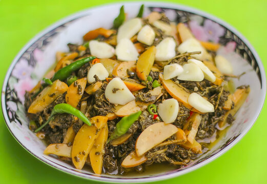 Burmese, Myanmar tea leaf salad called Lahpet thoke recipe with Djenkol Bean slices.