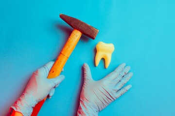 Unprofessional Dentist Holding a Hammer Hitting Tooth. Incompetent Doctor performing strange...