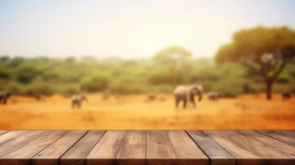 Fotobehang The empty wooden brown table top with blur background of Savanna Safari. Exuberant image. generative AI © Summit Art Creations