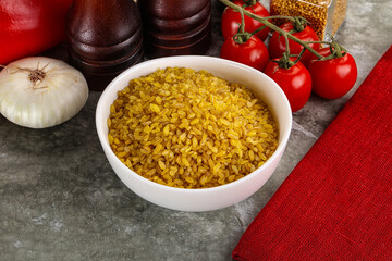 Dry wheat bulgur cereal heap