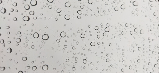 Water bubbles on glass. Water drops on the mirror
