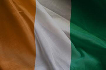 Obraz premium national wavy fabric flag of IVORY COAST