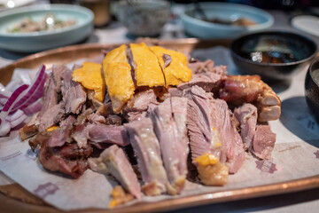 Pork Leg served with chili powder and dipping sauce