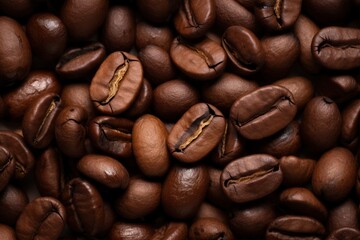 Naklejka premium Coffee bean viewed up close against a textured background