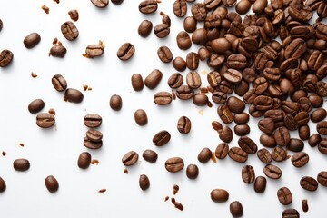 Naklejka premium Coffee beans falling on white background